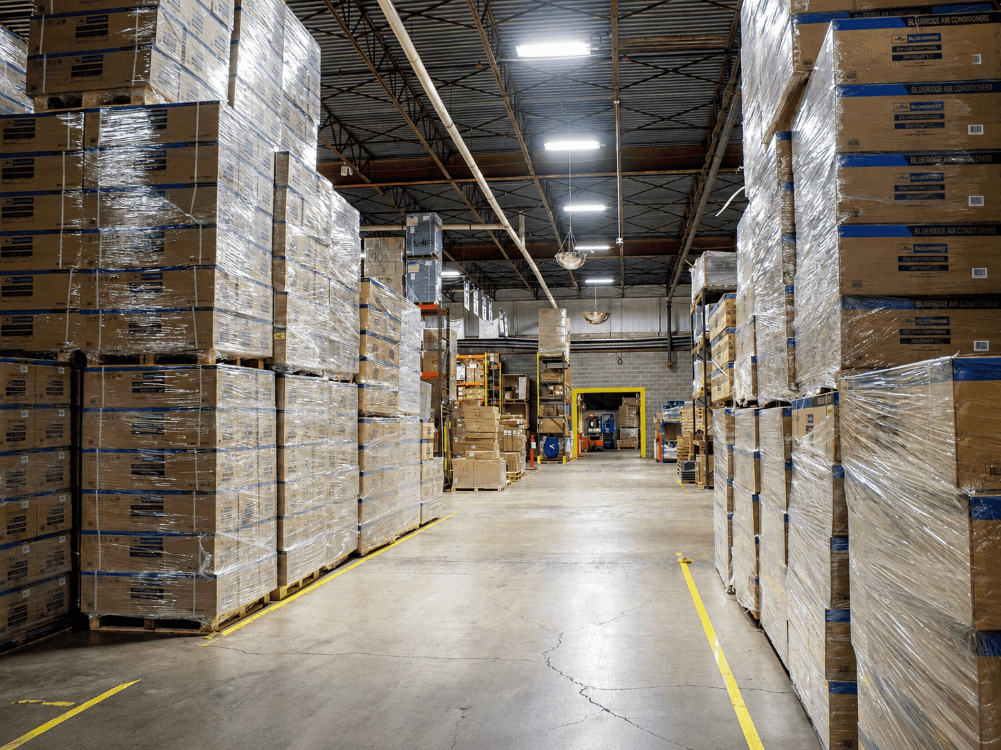 Warehouse aisle stocked with equipment